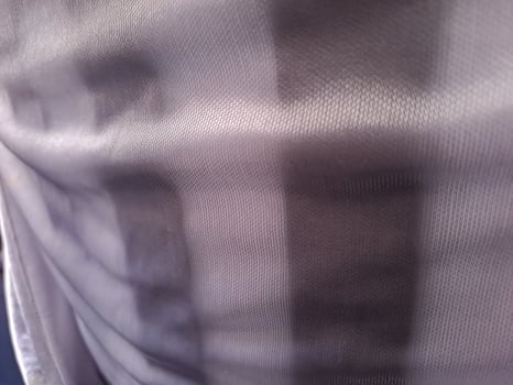 A close up of a white and black striped shirt photo