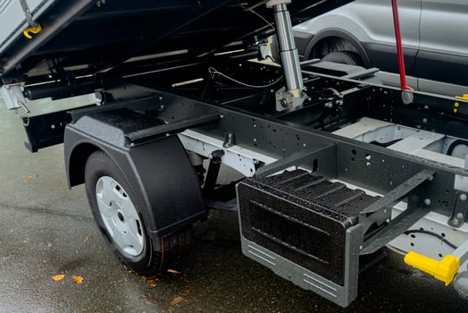 Detailed view of a truck trailer showing hydraulic lift system photo
