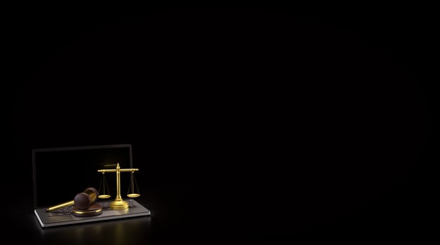 The Wood hammer and Libra on labtop for law concept 3d rendering. photo