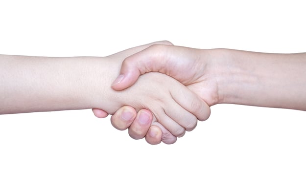 Man shaking hands with woman, white background photo