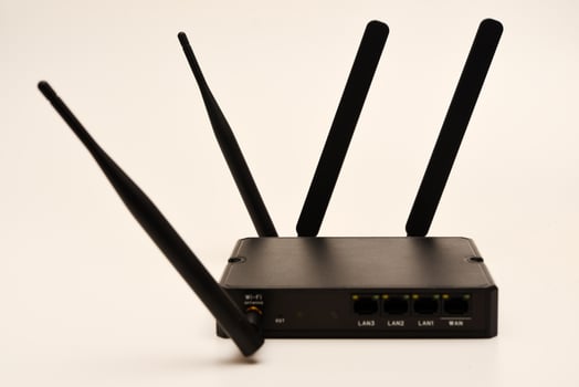 GSM modem. An Internet station with a SIM card. A black router on a white background. photo