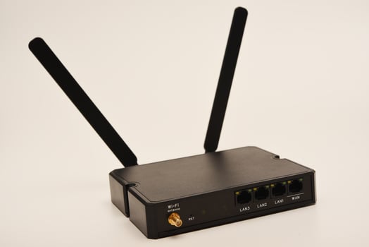 GSM modem. An Internet station with a SIM card. A black router on a white background. photo
