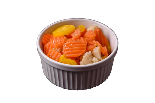 Delicious fresh vegetables steamed carrots, broccoli, cauliflower photo