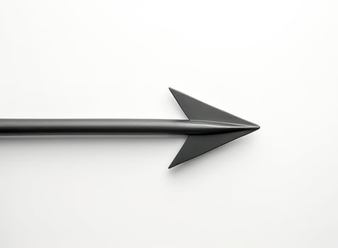 sleek dark gray arrow on white photo