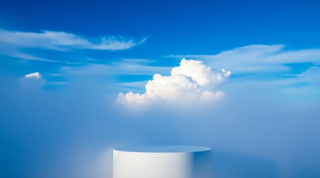 white cylinder a blue cloudy scene photo