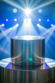 reflective metallic cylinder on illuminated stage photo