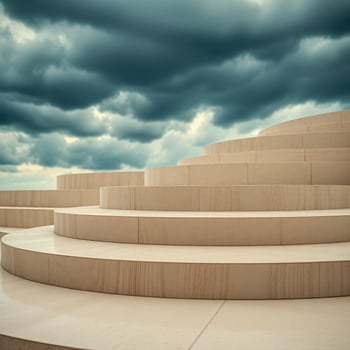 beige circular stone steps against a dramatic sky photo