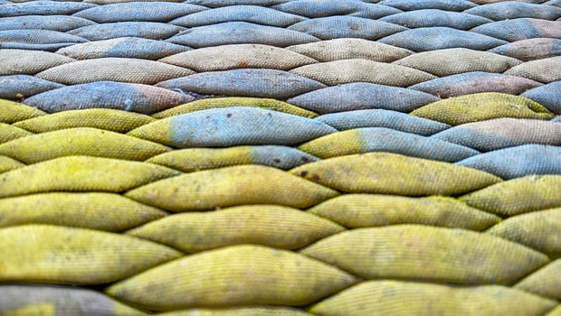 Sandbags arranged in rows photo