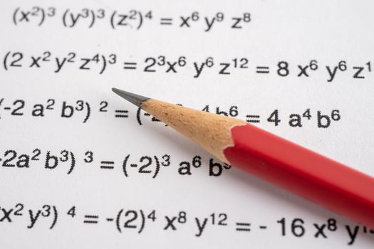 Pencil on mathematic formula exercise test paper in education school. photo