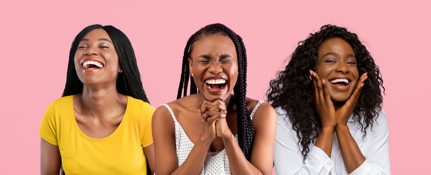 Set of headshots portraits of excited surprised African American women laughing posing standing isolated over pink studio background. Three emotional ladies smiling looking at camera, banner panorama photo