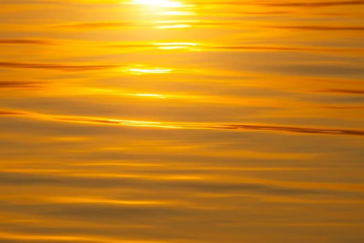 Close up water surface with sunlight. photo