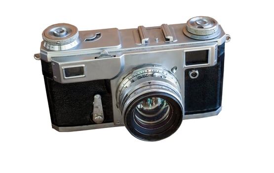 Old camera isolated on a white background. Vintage film camera with retro lens isolate. 19th century photo