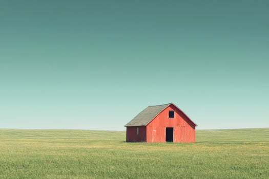 A red barn in a field photo