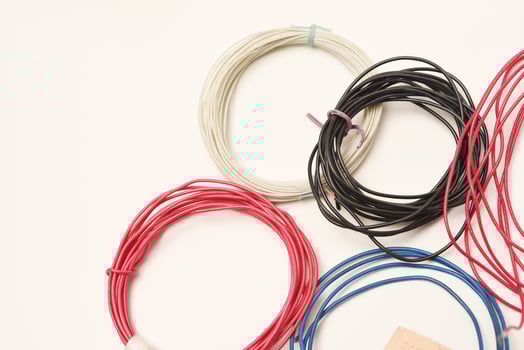 Coils of multicolored wires for electronics. Wires for devices. photo