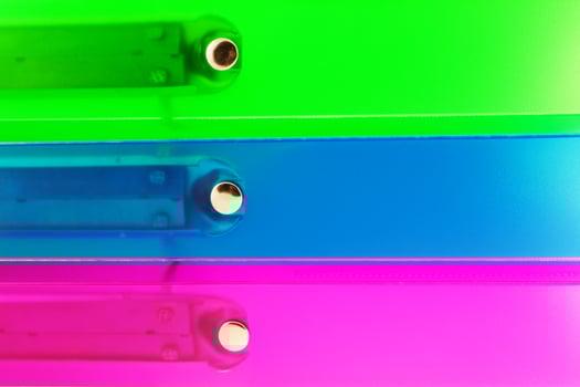 three multicolored folders photo