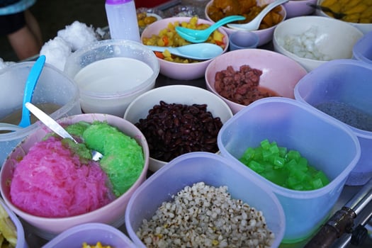 Close up colorful sweet toppings prepared for Thai style shaved ice dessert photo