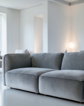 Gray Velvet Sofa Enhances Modern Living Room Decor Beautifully photo