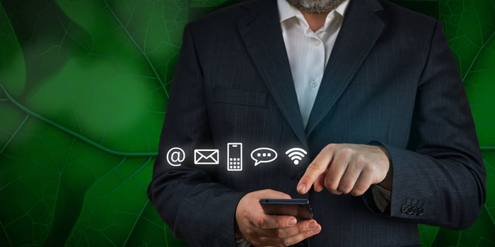 contact us concept using smartphone. Businessman holding mobile smartphone with icons. mail, phone, email. Cutomer support concept photo