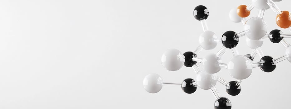 A white and black sculpture with many different colored balls photo