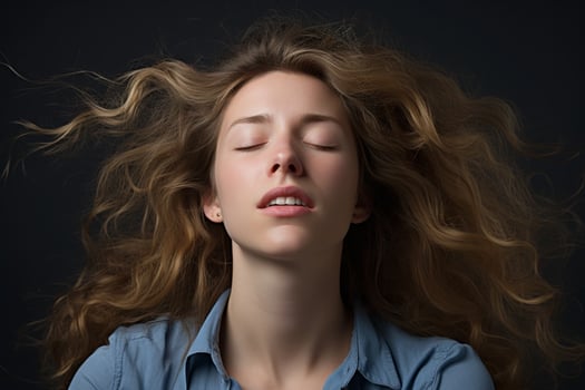 Windblown hair portrait of a young woman photo