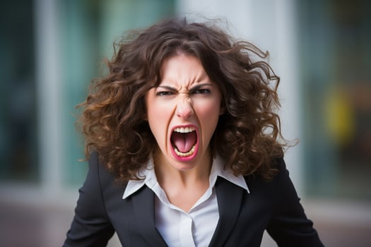 Angry businesswoman shouting photo