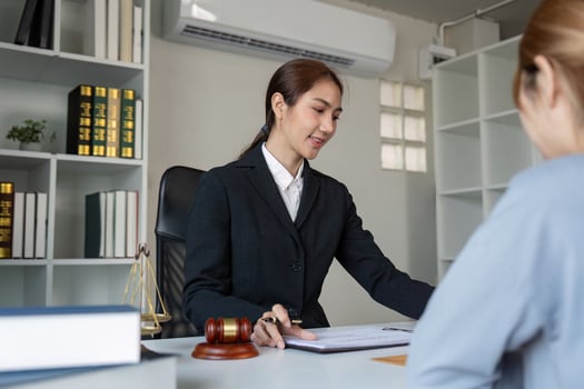 Lawyer consultation session office environment professional meeting modern workspace focused discussion on legal matters photo