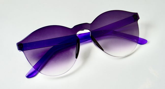 Purple gradient sunglasses eyewear isolated on horizontal white background. photo