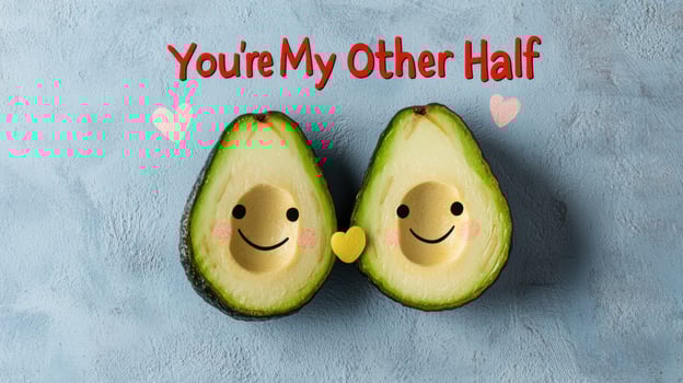 Avocado halves with faces and a heart between them, on a blue background Romantic concept for Valentines Day photo