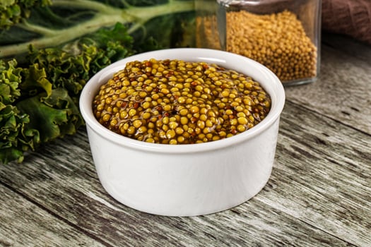 Mustard sauce with seeds in the bowl photo