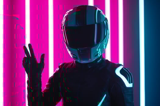 A person in a motorcycle helmet and neon lights photo
