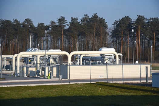 A large industrial plant with pipes and pipes photo