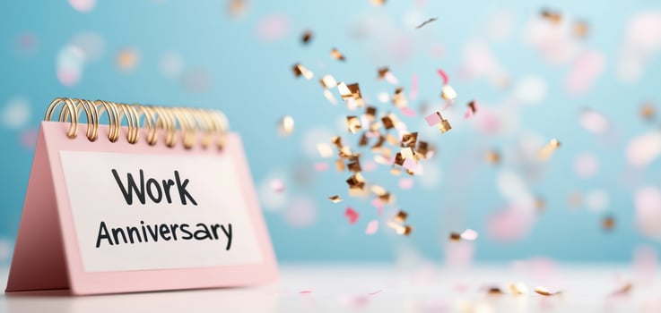 Work anniversary calendar with colorful confetti celebrating success photo
