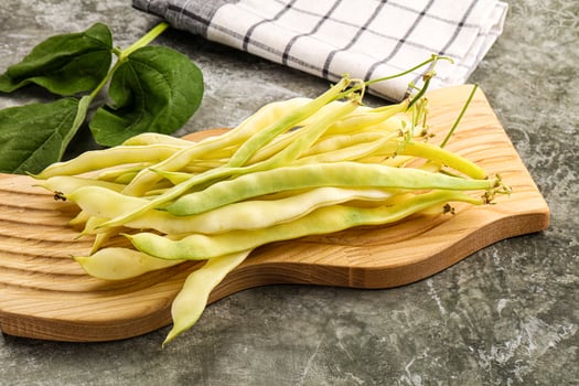 Raw green bean strings heap photo