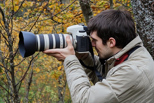 A man taking a picture photo