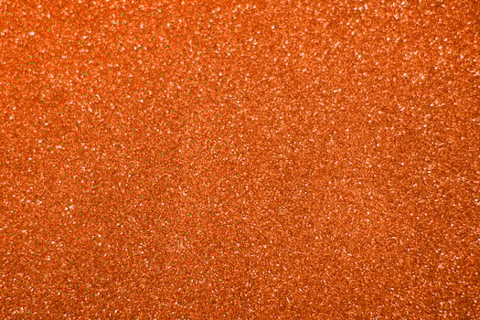 Orange glitter texture background photo