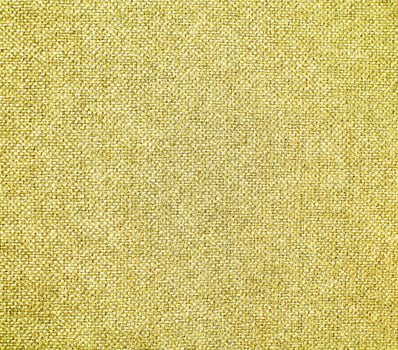 A yellow fabric background with a light green color photo