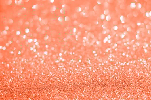 Orange glitter background with bokeh effect photo