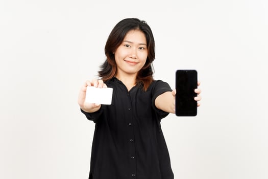 Holding Blank screen smartphone and credit bank card of Beautiful Asian Woman Isolated On White photo