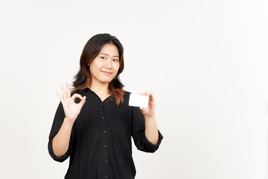 Holding Blank Bank Card Or Credit Card of Beautiful Asian Woman Isolated On White Background photo