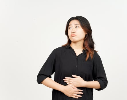 Stomachache gesture think about food, hungry concept of Beautiful Asian Woman Isolated On White photo