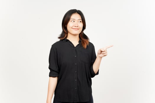 Showing Product and Pointing Side of Beautiful Asian Woman Isolated On White Background photo