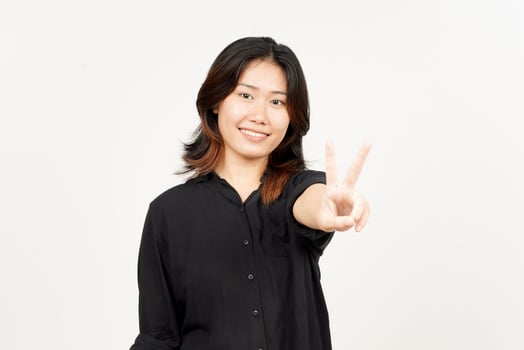 Showing peace sign of Beautiful Asian Woman Isolated On White Background photo
