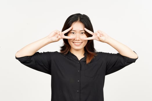 Showing peace sign of Beautiful Asian Woman Isolated On White Background photo