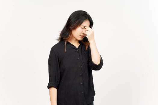 Suffering Headache gesture of Beautiful Asian Woman Isolated On White Background photo
