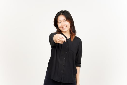 Smiling and pointing at camera of Beautiful Asian Woman Isolated On White Background photo
