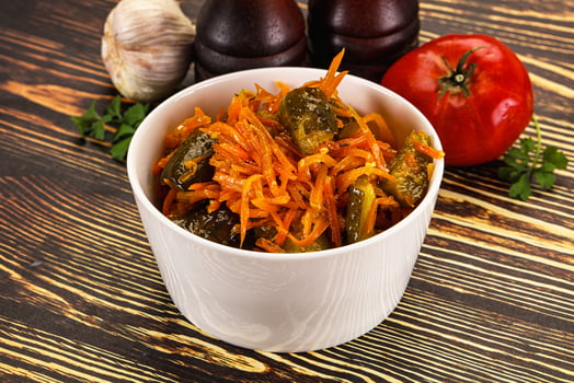 A white bowl filled with vegetables and spices photo