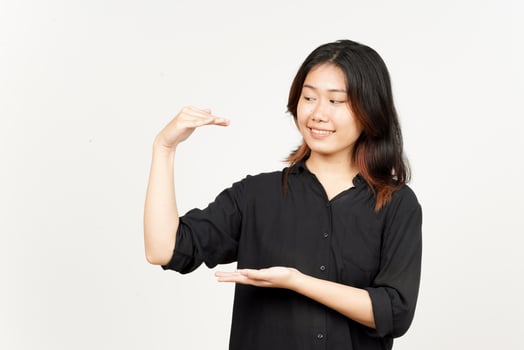 Measuring and Showing Big Sign Product of Beautiful Asian Woman Isolated On White Background photo
