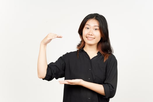 Measuring and Showing Big Sign Product of Beautiful Asian Woman Isolated On White Background photo