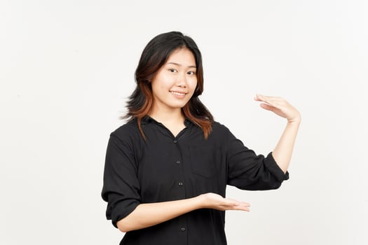 Measuring and Showing Big Sign Product of Beautiful Asian Woman Isolated On White Background photo