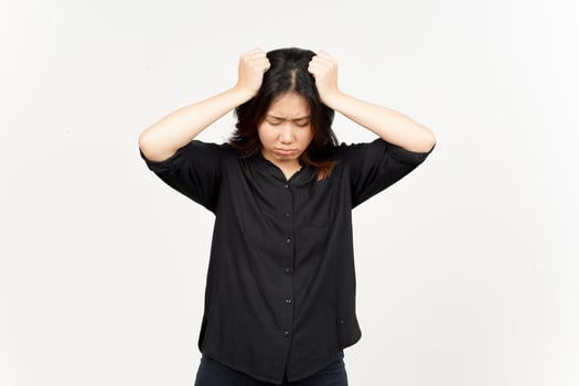 Suffering headache gesture of Beautiful Asian Woman Isolated On White Background photo